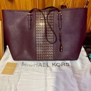 Authentic Michael Kors.